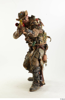 Photos Ryan Sutton in Postapocalyptic Suit shooting aiming gun gun…